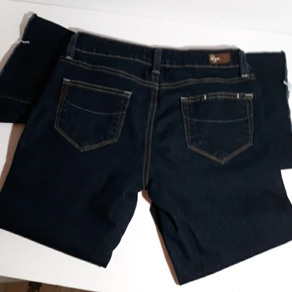 Paige 26 raw hem jeans boot cut